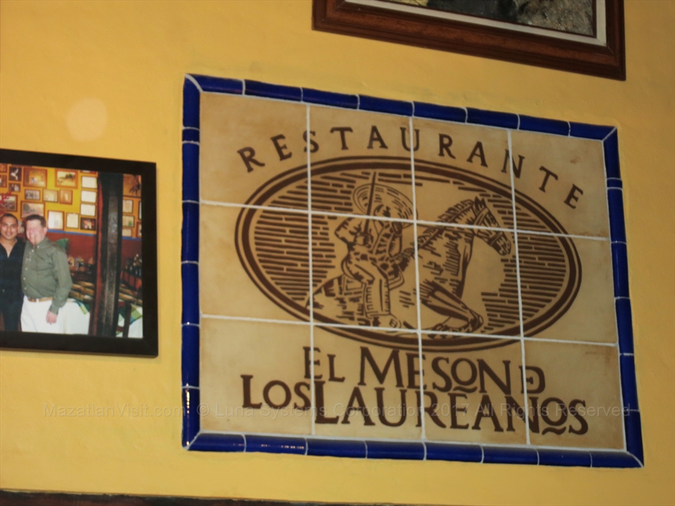 Traditional Mexican colonial decorations hanging in the restaurant main dining room