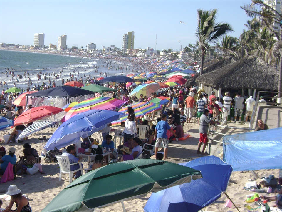 Massive tourist beach crowds during Semana Santa in Mazatlán, Mexico
