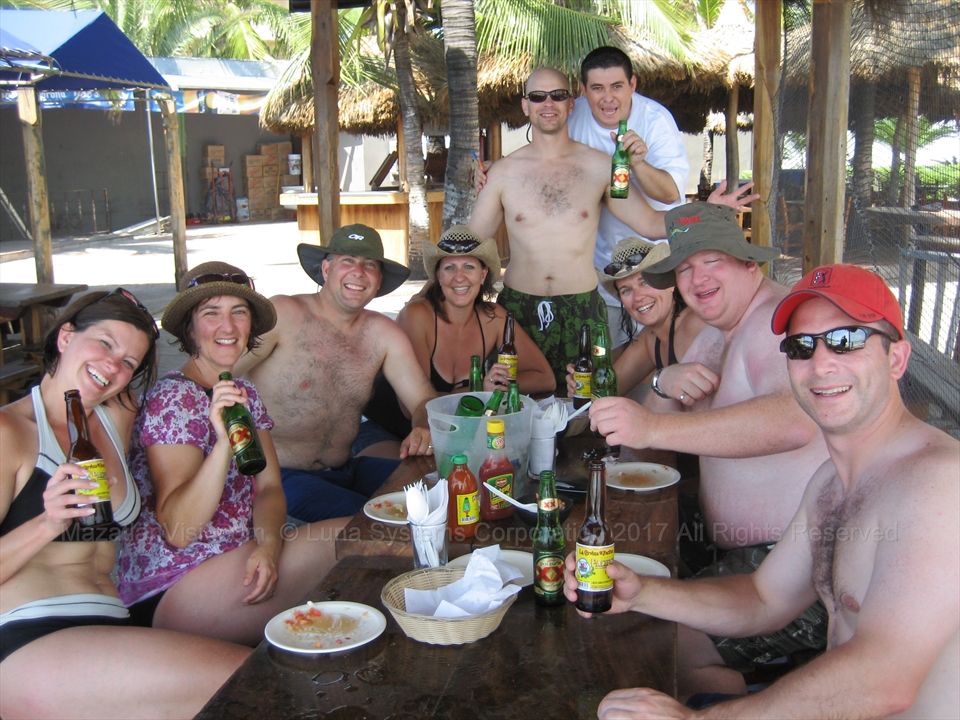Beachfront deck and palapa counters at Joe's Oyster Bar