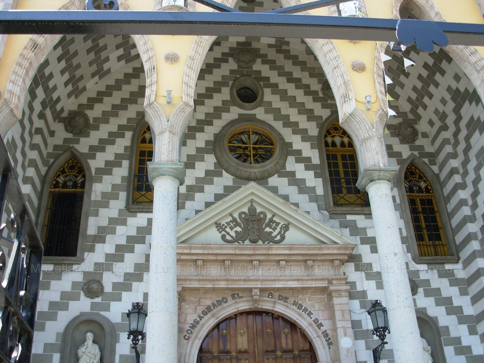 Wide angle perspective showing the neo-gothic spires framing the main town square loops