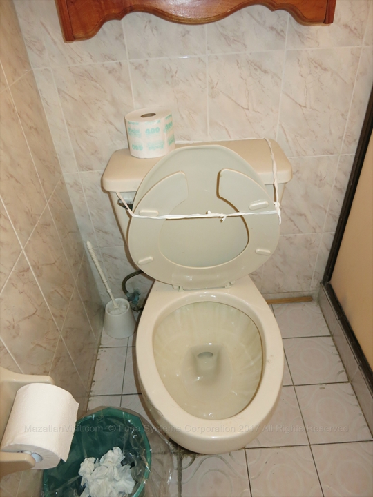 Clean guest bathroom layout inside a local Mazatlán hotel suite