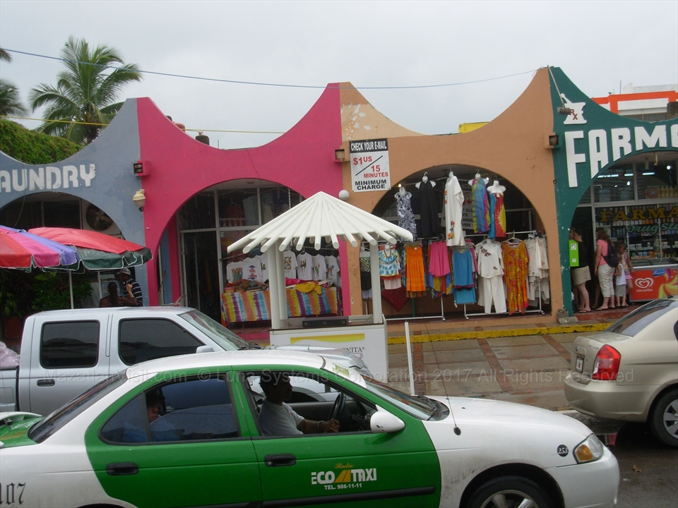 Resort boutique clothing shops along Avenida Playa Gaviotas