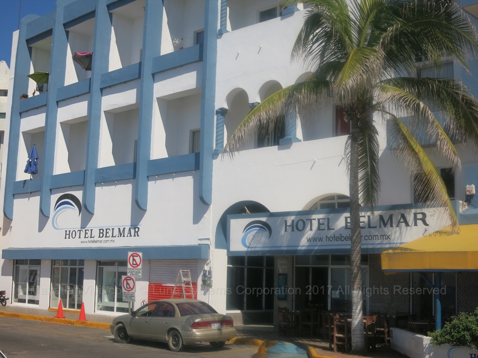 The historic tiled exterior architecture of Hotel Belmar at Olas Altas