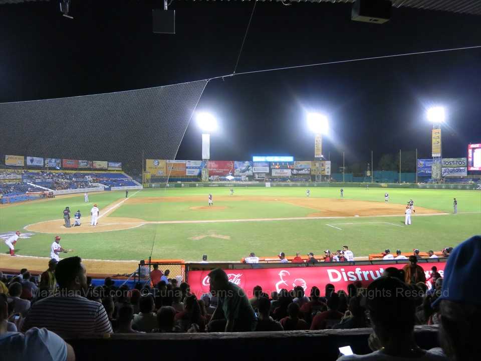 Professional baseball game action underway inside the main sports stadium in Mazatlán
