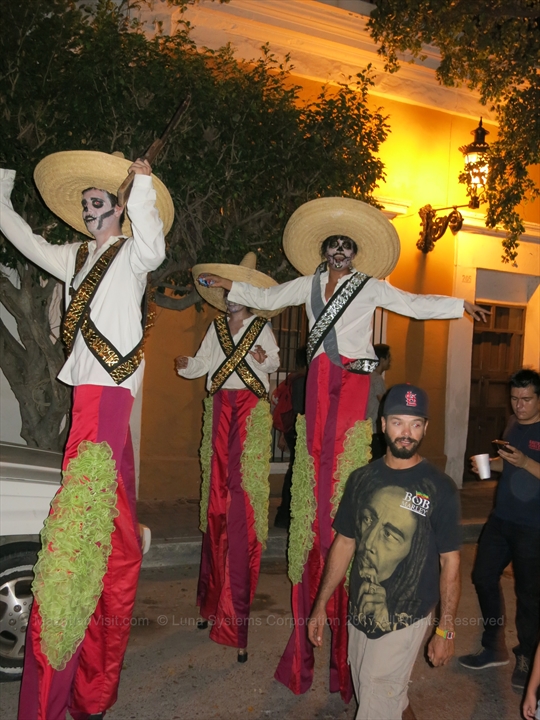 Spectators dressing up with custom skull facepaint on November 1st