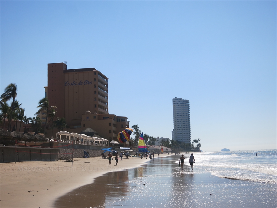 Wide sandy resort beach corridor along Playa Sabalo area
