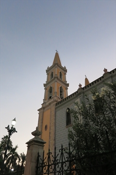 Scenic high angle view tracking across the central cathedral courtyard gate lines
