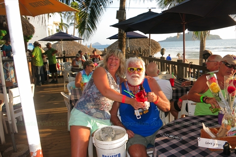 Local event regular Hank from Ohio dressed up in full tropical Santa Claus attire at the bash