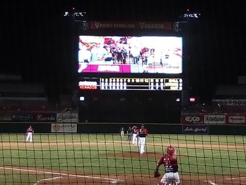 The stadium big screen tracking stadium attendance metrics