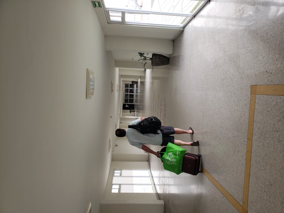 Clean modern corridor hallways guiding travelers toward the immigration desks