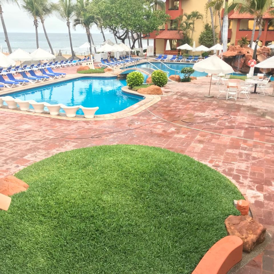 Oceanfront balconies and pool channels of Luna Palace Hotel