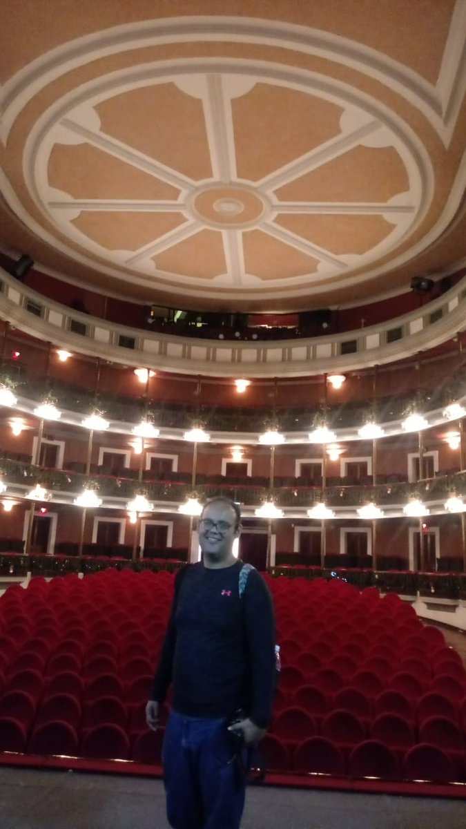 The elegant historic exterior facade of the Angela Peralta Theater near Plaza Machado