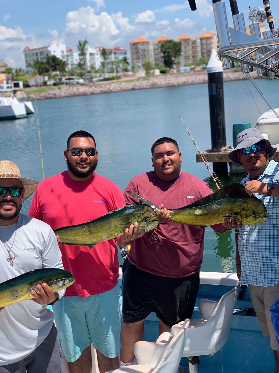 Anglers casting lines near the timbered structures of Lake El Salto