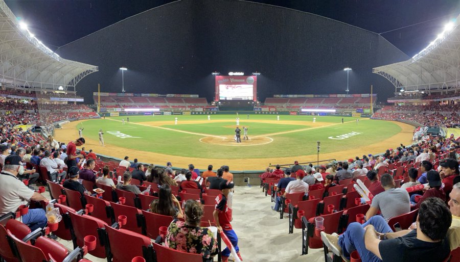 The stadium video board engaging fans with the interactive Kiss Cam during a night game