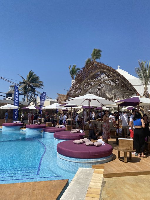 Dayclub patrons enjoying pool parties under the beautiful afternoon sun