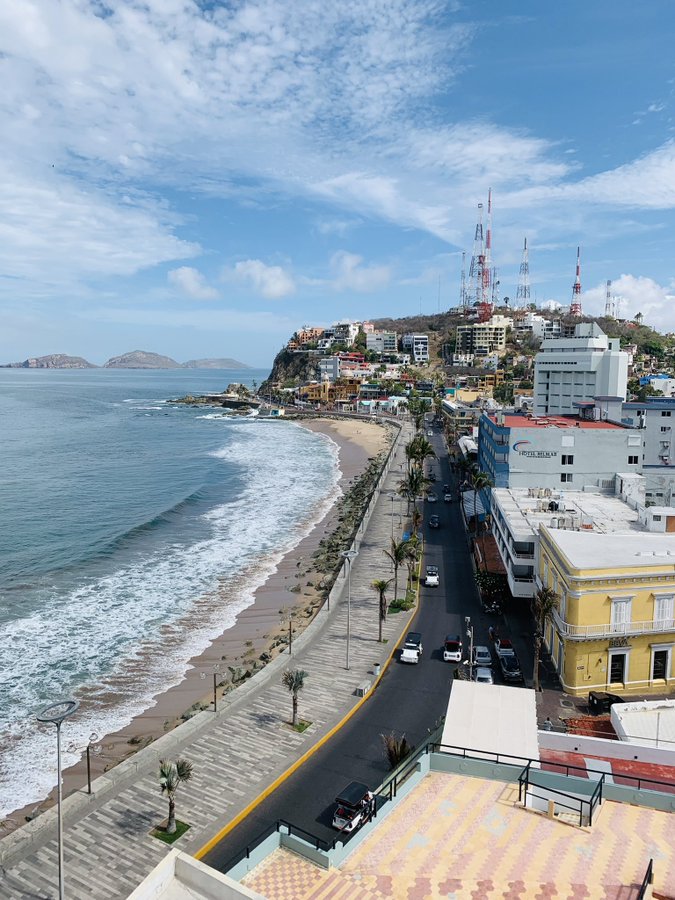 The historic colonial facade of Olas Altas beach promenade with older hotels